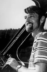 Roy L. Carlson at the helm of Sisiutl in 1973